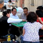 Chinese playing majong outside