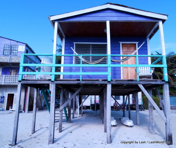 colorful seaside wooden cabins at Caye Caulker - Belize