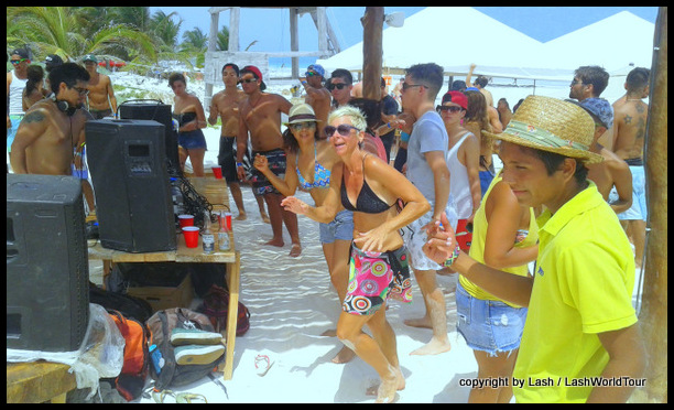 dancing at a Sunday rave party on Tulum Beach 