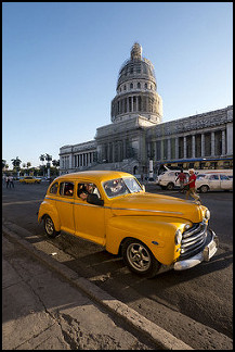 vintage car and capital building in Havana - photo by Bryan Ledgard on Flckr CC