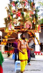 Thaipusam- devotee carrying palanquin