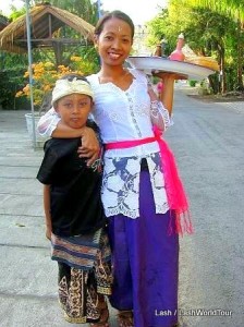 Local woman and her child dressed for ceremony