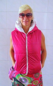 LashWorldTour in pink hoodie vest