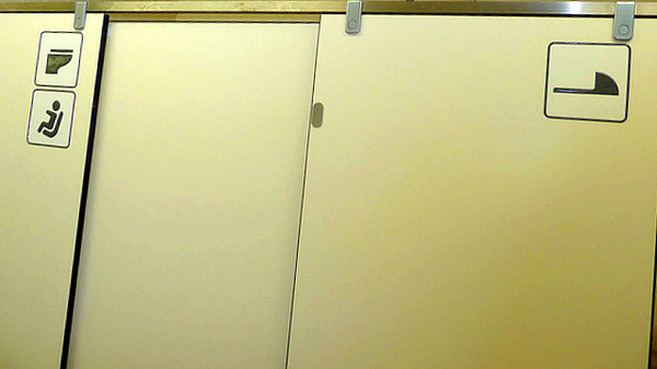 Japanese toilet stall icons - photo by  Ellazar Parra Cardenas  on Flickr CC