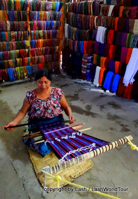Mayan woman demonstrating weaving techniques
