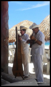 Traditional Mexican musicians on Puerto Morelos Beach - Mexico