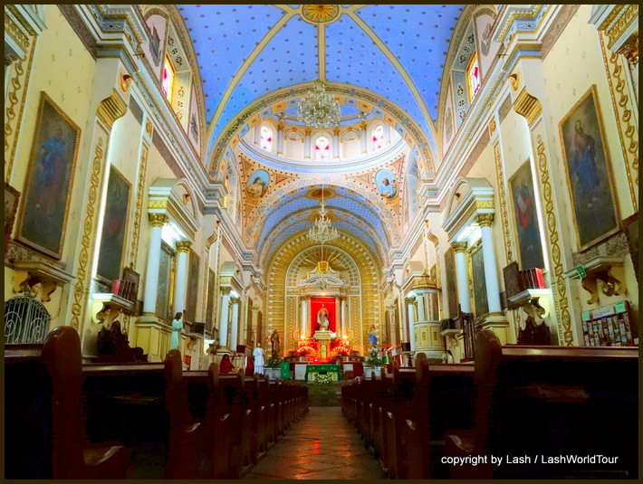 elaborate interior of a Baroque church in Puebla - Mexico
