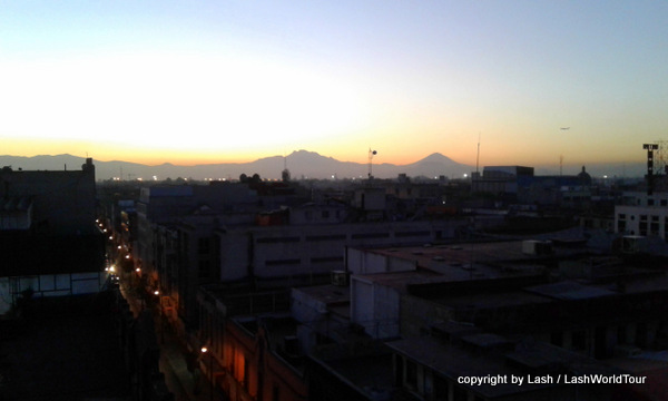 Volcanic peaks surrounding Mexico City at sunrise