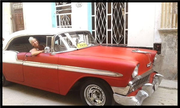 heading to the airport in Havana in a spiffy 1950s car!
