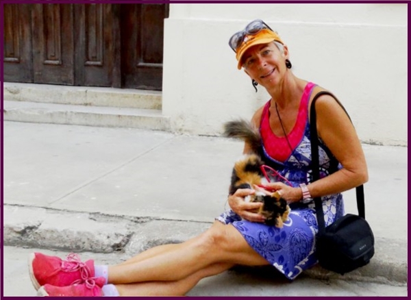 hanging out with a  with cat in Havana
