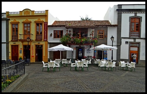 outdoor restaurant seating on a town plaza in Canary Islands - Spain